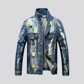Distressed men's denim jacket